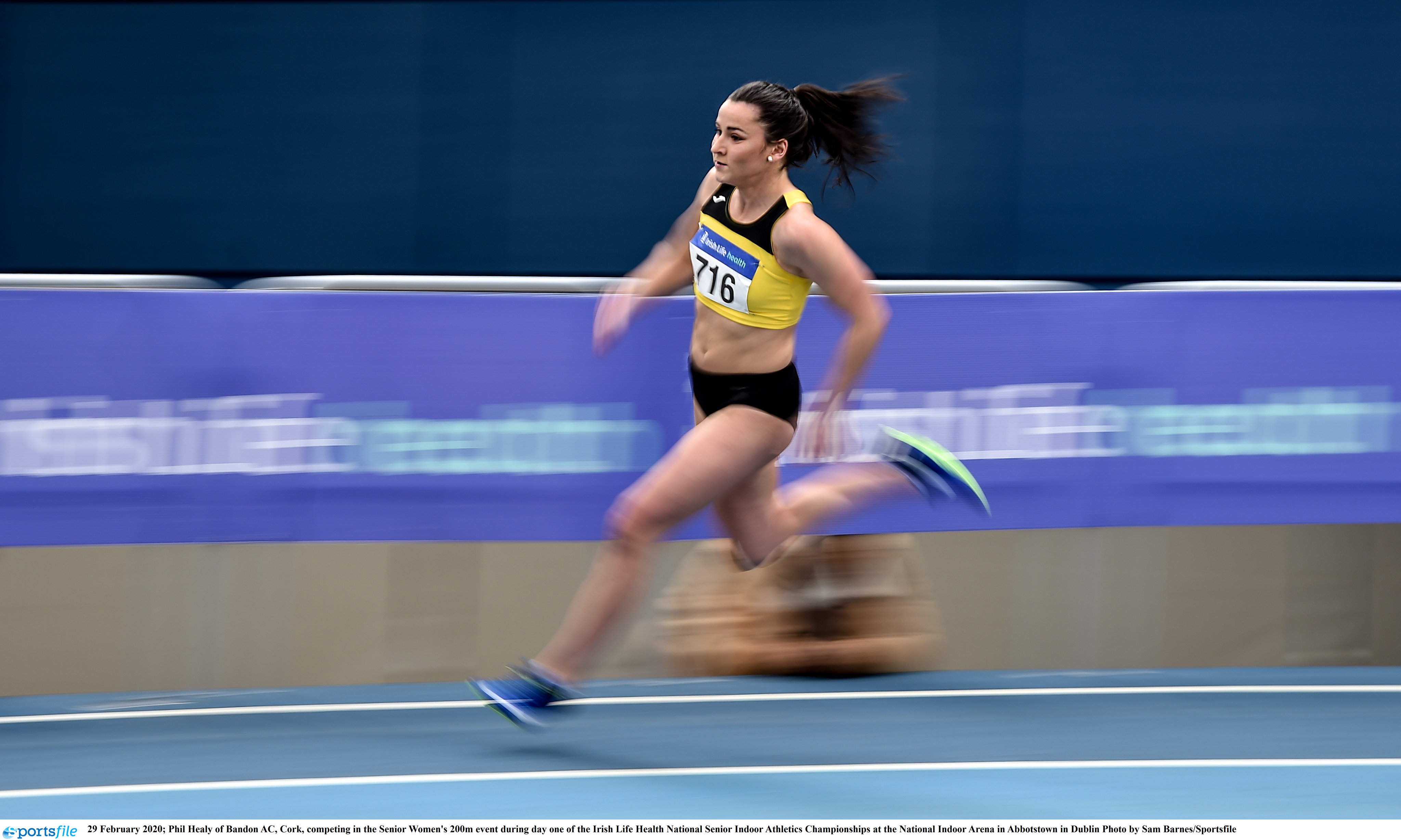 Healy whirs to 200m championship record on day 1